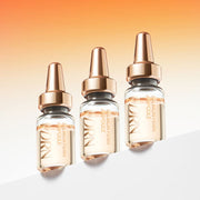ProtoClinical k-beauty slim pale gray beauty product silhouette with a warm beige top on a light background.