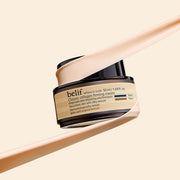 ProtoClinical k-beauty warm beige beauty product silhouette centered on a soft cream background.