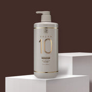 ProtoClinical k-beauty [mise en scene] Salon 10 Protein Hair Mask(Treatment) For Extremely Damaged Hair 1150ml single upright treatment bottle with a pale center on a dark brown background