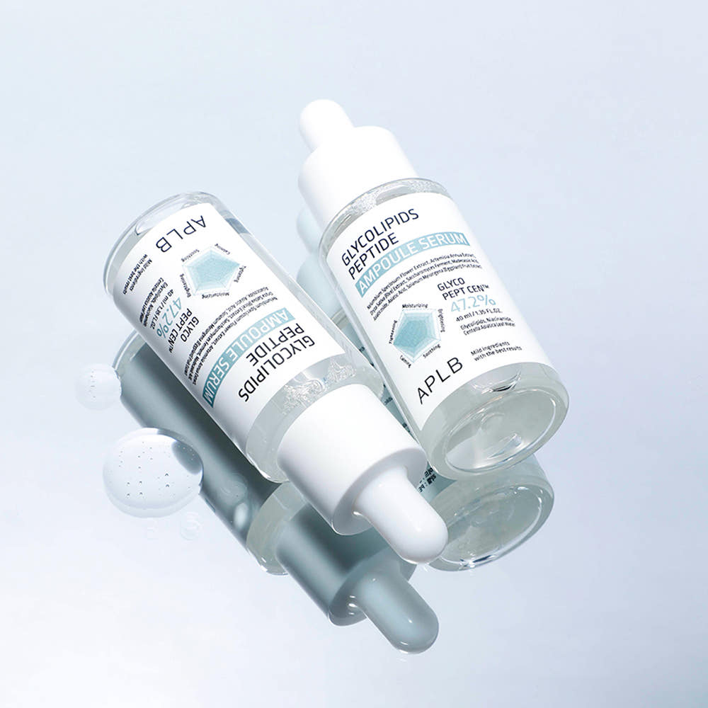 ProtoClinical k-beauty APLB Glycolipids Peptide Ampoule Serum 40ml single rounded serum bottle angled toward the lower left on a pale blue background