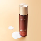 ProtoClinical k-beauty amber-toned cosmetic product packaging with bright yellow side accents on a light background.