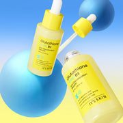 ProtoClinical k-beauty beauty product packaging with blue, green, and yellow accents on a light background.