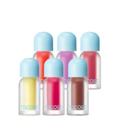 ProtoClinical k-beauty TOCOBO Juicy Berry Plumping Lip Oil 4g single upright lip oil container with a soft pink center on a pale cream background