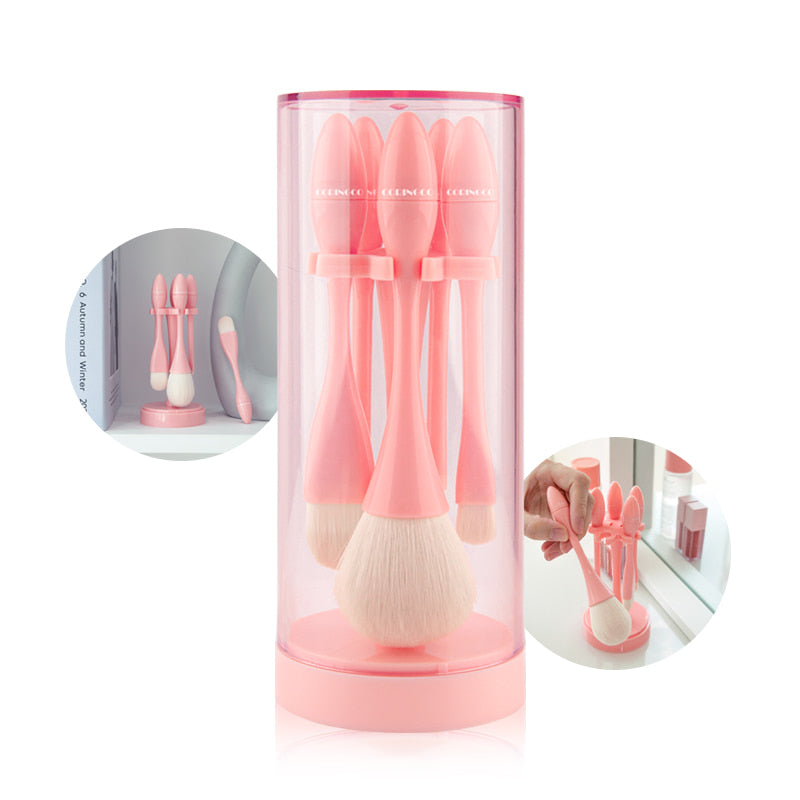 CORINGCO Egg Holder Brush Set 5P by ProtoClinical, a k-beauty beauty tool set showing five makeup brushes with a compact egg-shaped holder.