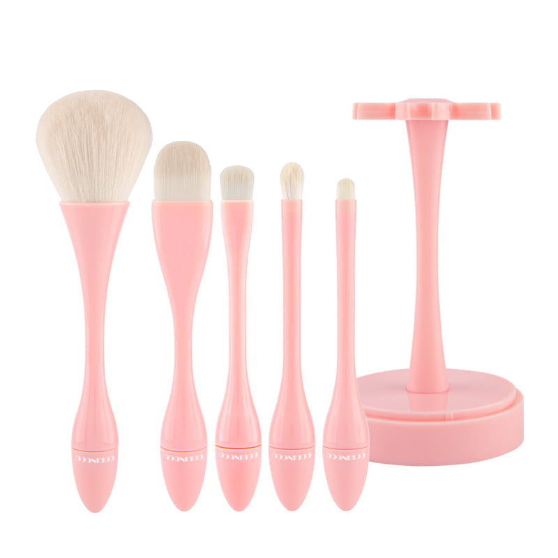 CORINGCO Egg Holder Brush Set 5P by ProtoClinical, a k-beauty makeup brush set with five brushes and a rounded egg-shaped holder shown in a clean studio product layout.