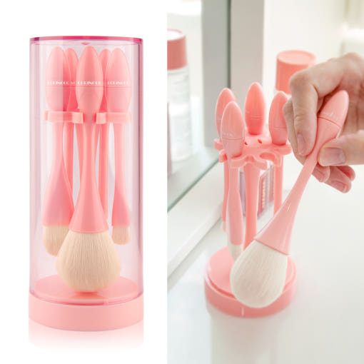 ProtoClinical k-beauty CORINGCO Egg Holder Brush Set 5P with five makeup brushes, a rounded egg-shaped holder, and product packaging on a light background