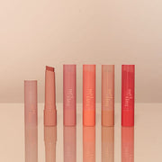 ProtoClinical k-beauty ETUDE Ginger Sugar Melting Balm 2.3g single coral lip balm tube lying horizontally on a cream background