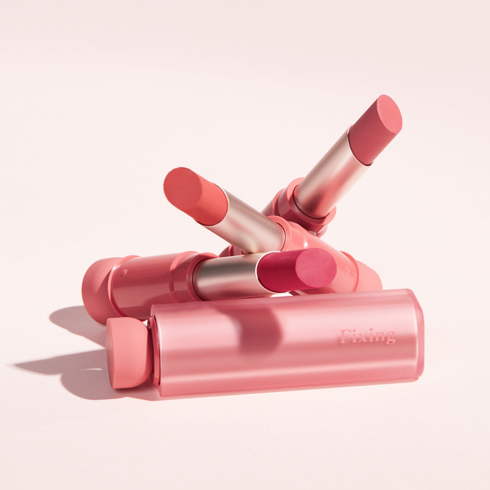 ProtoClinical k-beauty ETUDE Fixing Tint Bar 3.2g square studio image with slim pink tint bar packaging, rose-toned color, and a pale background