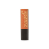 ProtoClinical k-beauty ETUDE Ginger Sugar Lip Balm Stick 3.7g single dark brown lip balm stick standing upright on a pale blue and white background