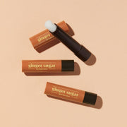 ProtoClinical k-beauty ETUDE Ginger Sugar Lip Balm Stick 3.7g single brown lip balm stick centered on a warm peach background