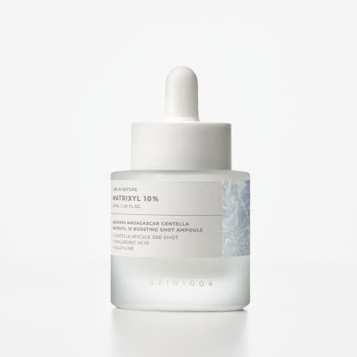 ProtoClinical k-beauty SKIN1004 Madagascar Centella Matrixyl 10 Boosting Shot Ampoule 30ml ampoule product packaging with soft pale side accents on a white background.