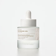 ProtoClinical k-beauty SKIN1004 Madagascar Centella Niacinamide 10 Boosting Shot Ampoule 30ml ampoule product packaging on a light background.