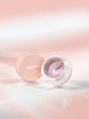 ProtoClinical k-beauty A'pieu Juicy Pang Glossy Jelly Highlighter 3.8g (2 Colors) open clear jar with pearly mauve jelly, pink lid beside it on a soft peach gradient background