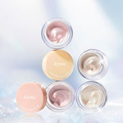 ProtoClinical k-beauty A'pieu Juicy Pang Glossy Jelly Highlighter 3.8g (2 Colors) four open jars and two lids stacked on a cool blue reflective background