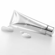 ProtoClinical k-beauty 9wishes Miracle White Cream 50ml silver tube shown diagonally with three white cream dollops on a white background
