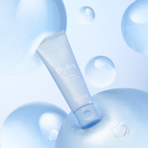 ProtoClinical k-beauty 9wishes Hydra Ampoule Cream Nano Plus+ 50ml three upright blue-gray cream containers on a pale cream background with soft blue lower accents