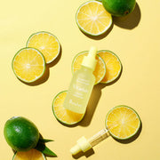 ProtoClinical k-beauty 9wishes Tangerine C Vitamin Ampoule 30ml single upright yellow ampoule package on a warm yellow background with olive green corner accents
