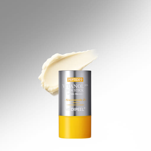 ProtoClinical k-beauty MEDIPEEL PEPTIDE 9 VITANOL SUN STICK PRO SPF50+ PA++++ 23g single upright gold sun stick packaging on a gray and pale blue background.