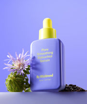 ProtoClinical k-beauty [By Wishtrend] Pore Smoothing Bakuchiol Serum 30ml lavender serum bottle with a yellow dropper cap beside a purple flower on a lavender background