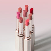 ProtoClinical k-beauty [DEAR DAHLIA] Lip Allure Glow Shine 2.4g (8colors) single rosy lip color swatch centered on a pale aqua and white background