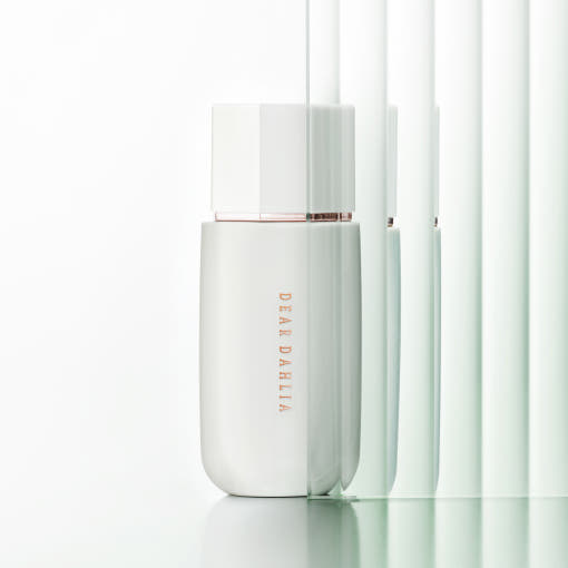 ProtoClinical k-beauty muted mauve beauty product silhouette with a pale vertical center on a light background.
