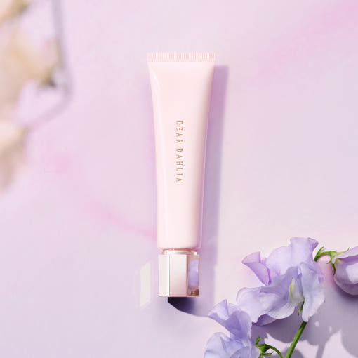 ProtoClinical k-beauty soft pink beauty graphic with a pale blue lower-right panel on a light background.