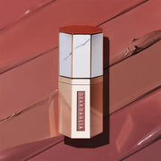 ProtoClinical k-beauty [DEAR DAHLIA] Paradise Dream Velvet Lip Mousse 6.5ml muted red lip mousse silhouette centered on a warm pink background