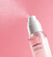 ProtoClinical k-beauty MEDICUBE: PDRN Pink Collagen Glow Jelly Mist Serum (100ml) single upright pale pink mist bottle centered on a light background