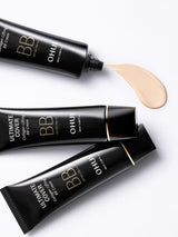 ProtoClinical k-beauty dark gray beauty product packaging on a light neutral background.