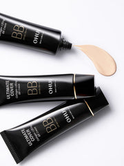 ProtoClinical k-beauty dark gray beauty product packaging on a light neutral background.