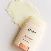 ProtoClinical k-beauty warm beige beauty product graphic with a darker vertical center on a soft neutral gradient background.