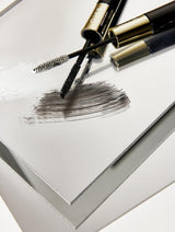 ProtoClinical k-beauty tall beige and dark beauty product on a clean white background.