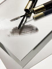 ProtoClinical k-beauty tall beige and dark beauty product on a clean white background.