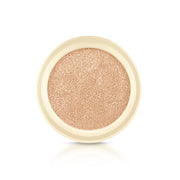 ProtoClinical k-beauty warm beige beauty product with pale blue side accents on a light background.