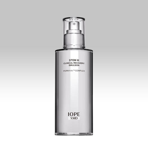 ProtoClinical k-beauty IOPE XMD STEM III Clinical Recovery Emulsion 130ml slim gray emulsion bottle on a pale lavender and white background