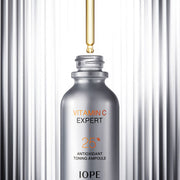 ProtoClinical k-beauty IOPE Vitamin C Expert 25% Antioxidant Toning Ampoule 23ml slim gray ampoule bottle on a white background