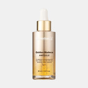 ProtoClinical k-beauty CENTELLIAN24 Golden Madeca Ampoule 30ml single upright beige ampoule bottle centered on a light background with pale blue side tones