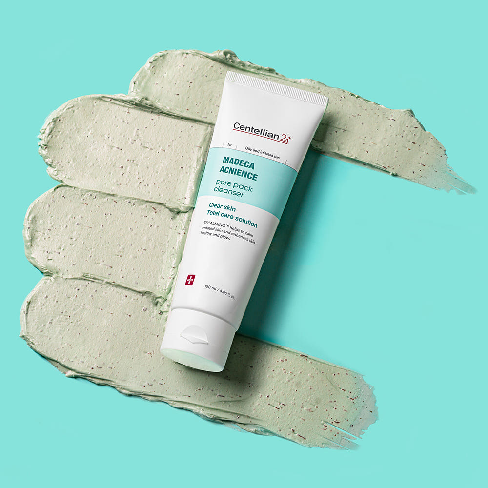 ProtoClinical k-beauty CENTELLIAN24 Madeca Acnience Pore Pack Cleanser 120ml white cleanser tube angled over sage green cream swatches on a turquoise background