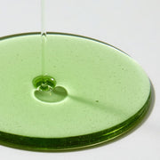 ProtoClinical k-beauty pale green beauty graphic with a darker olive lower band on a soft lavender background.