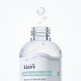 ProtoClinical k-beauty KLAIRS Freshly Juiced Vitamin Essence Toner 180ml shown as a single pale blue toner bottle centered on a light blue and white background