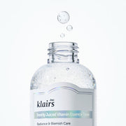 ProtoClinical k-beauty KLAIRS Freshly Juiced Vitamin Essence Toner 180ml shown as a single pale blue toner bottle centered on a light blue and white background