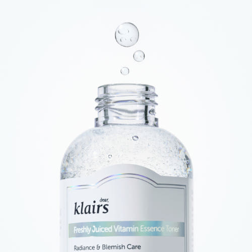 ProtoClinical k-beauty KLAIRS Freshly Juiced Vitamin Essence Toner 30ml shown as a single pale bottle centered on a light blue and white background
