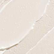 ProtoClinical k-beauty [THANK YOU FARMER] Rice Pure Barrier Capsule Cream 80ml close-up cream swatch with scattered white capsule beads and smooth pale beige texture