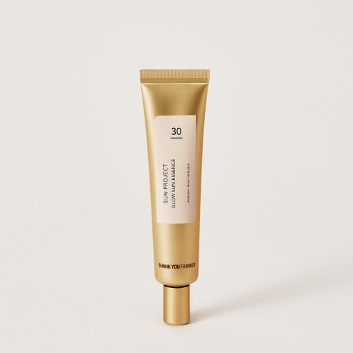 ProtoClinical k-beauty warm beige beauty product silhouette with pale blue side accents on a light background.