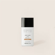 ProtoClinical k-beauty pale cream beauty product detail with a dark olive round center on a light background.