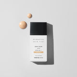 ProtoClinical k-beauty dark gray beauty product silhouette with a pale gray top on a clean white background.