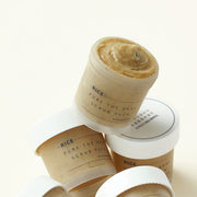 ProtoClinical k-beauty tall beige beauty bottle centered on a light background with soft blue side tones.