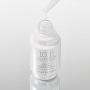ProtoClinical k-beauty [NATURE REPUBLIC] Expert Drop Radiance Ampoule 25ml abstract beauty graphic with a soft gray vertical center, pale lavender edges, and faint pink side accents on a light background
