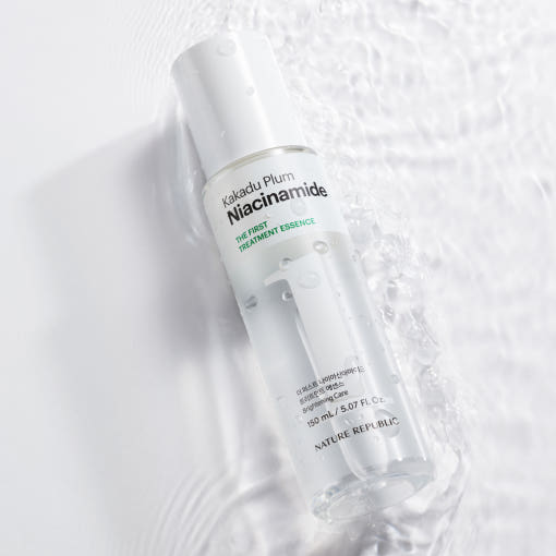 ProtoClinical k-beauty [NATURE REPUBLIC] The First Niacinamide Treatment Essence 150ml shown as a single centered gray bottle silhouette on a pale blue background with soft white side shading