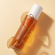 ProtoClinical k-beauty [NATURE REPUBLIC] Kombucha Black Tea Treatment Essence 140ml warm amber bottle silhouette with a soft brown center on a light background